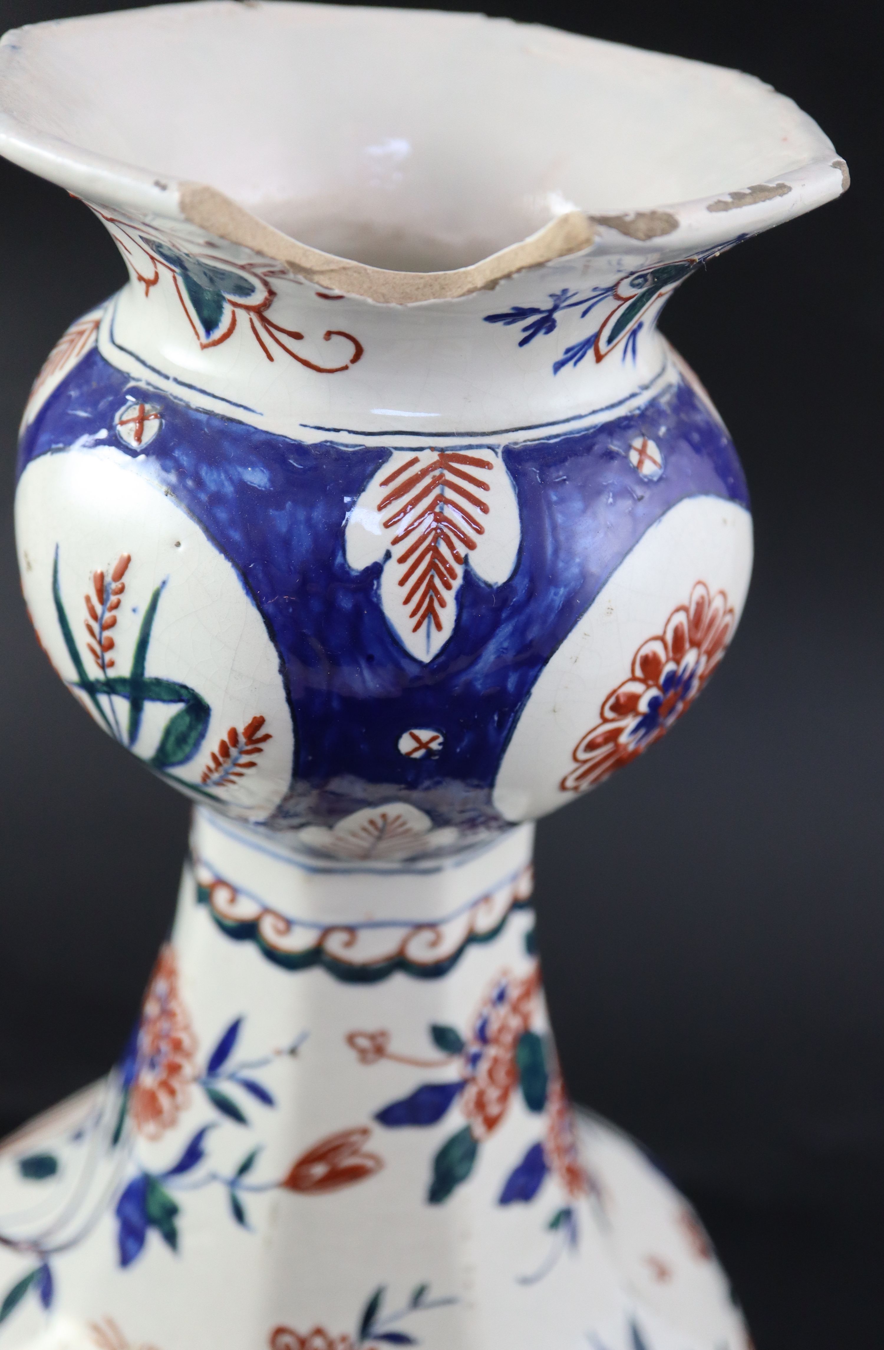 A 19th century faience octagonal vase, height 36cm (a.f.)